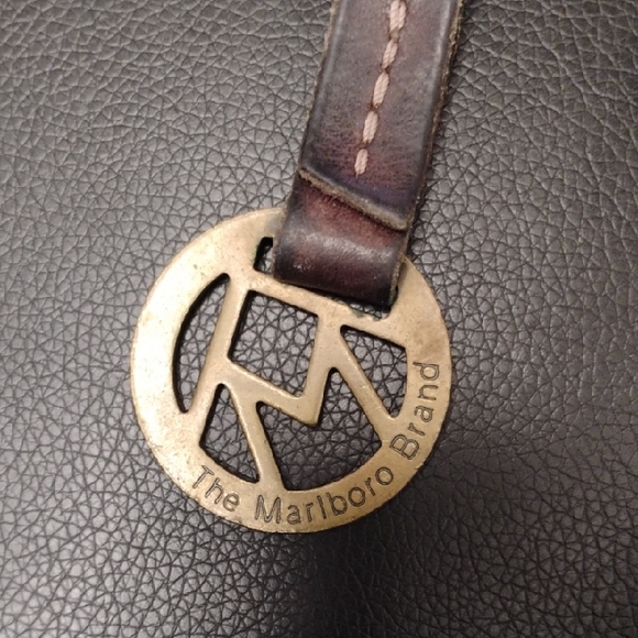 Marlboro Other - VINTAGE THE MARLBORO SOLID BRASS AND LEATHER KEY CHARM NRMINT CONDITION